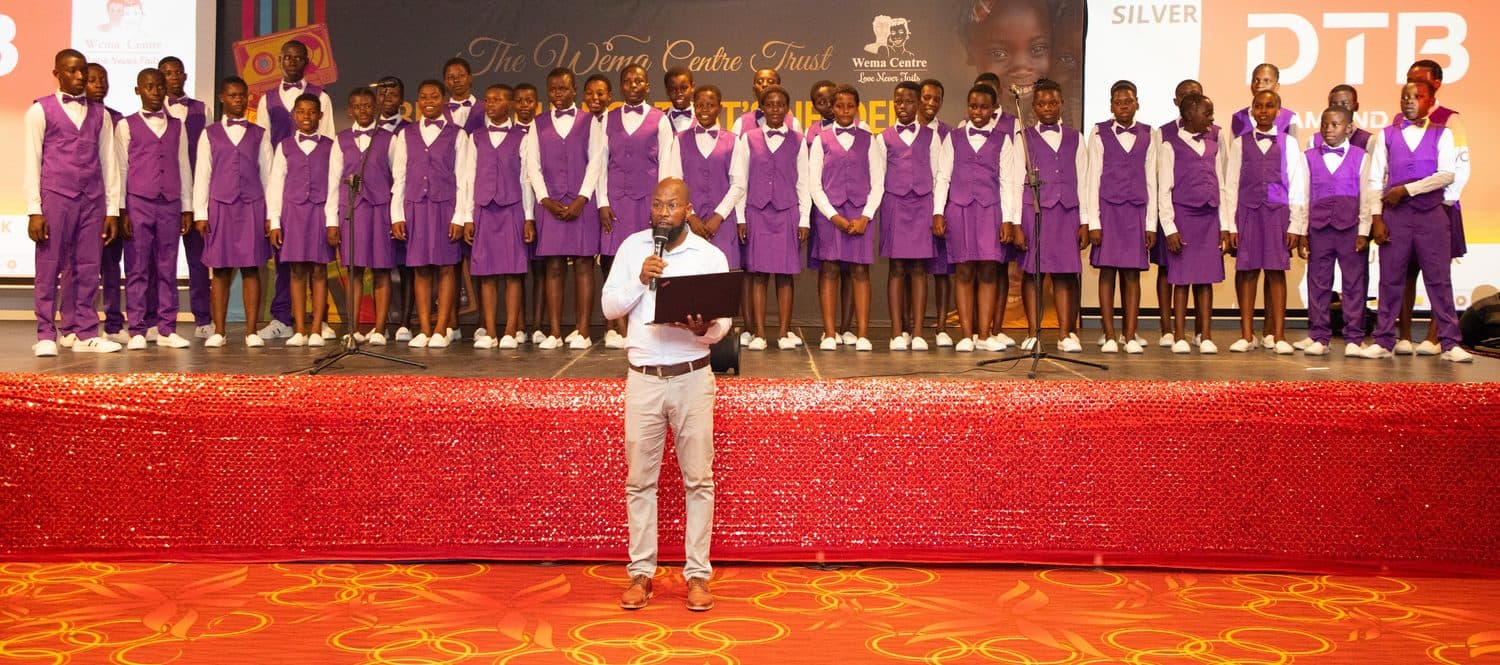 The Wema choir lined up on stage at the gala