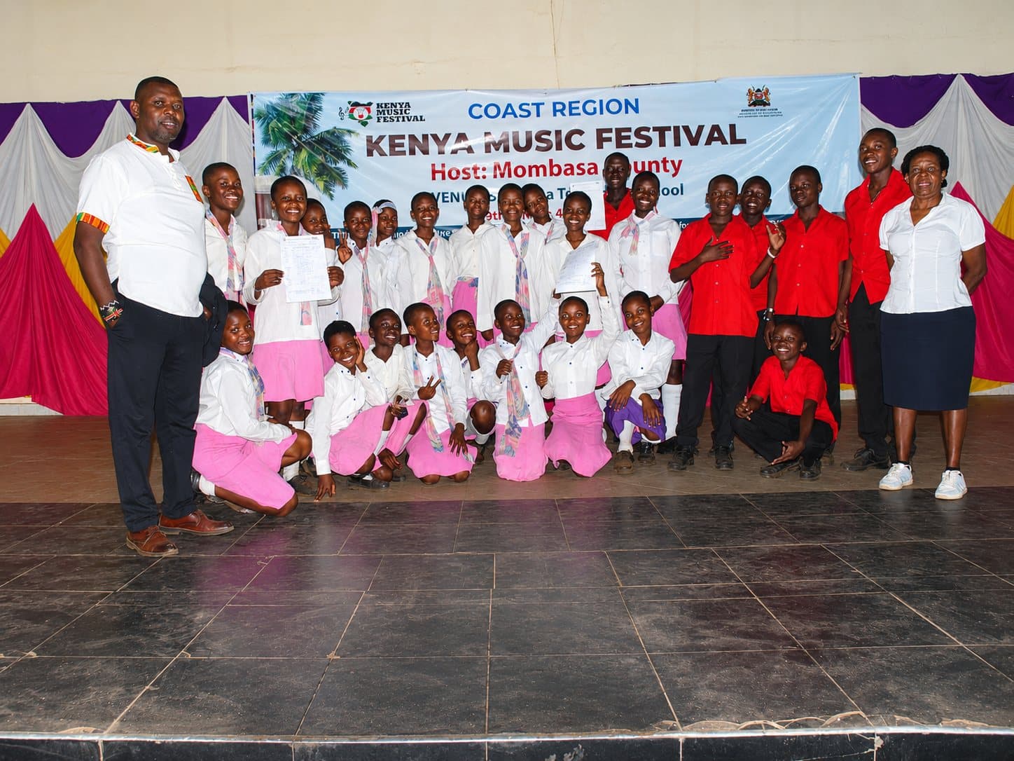 Wema Centre's choir and their conductor at the Coast regional Kenya Music Festival 2026