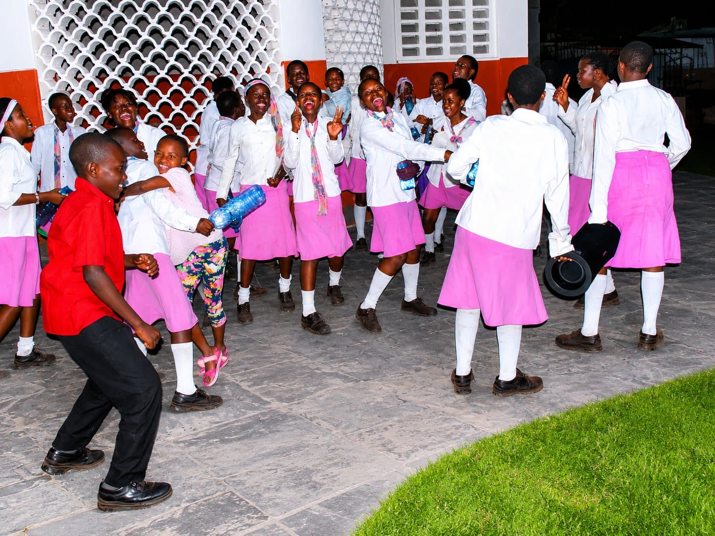 Children dancing and celebrating their festival results